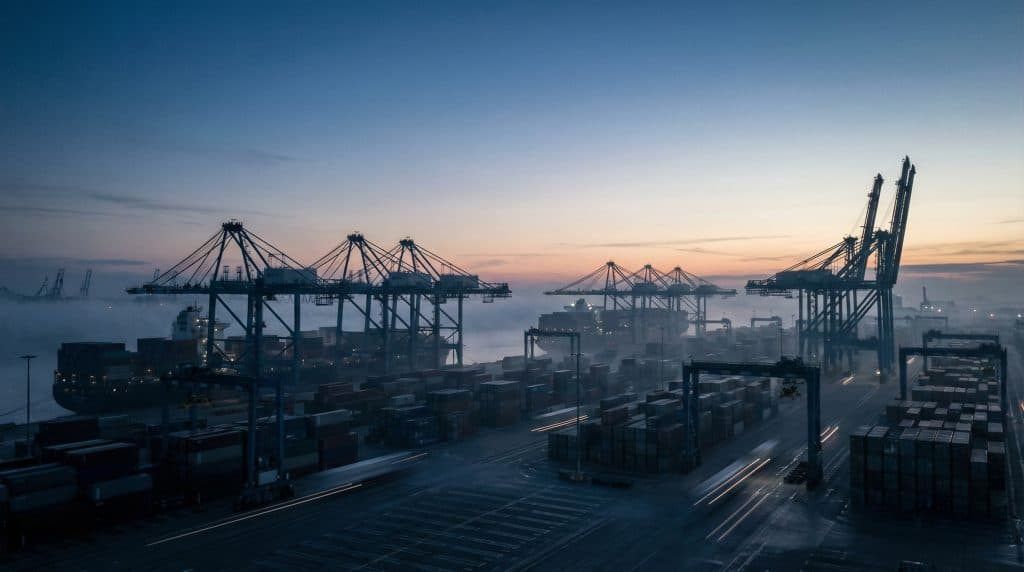 Container port infrastructure at dusk